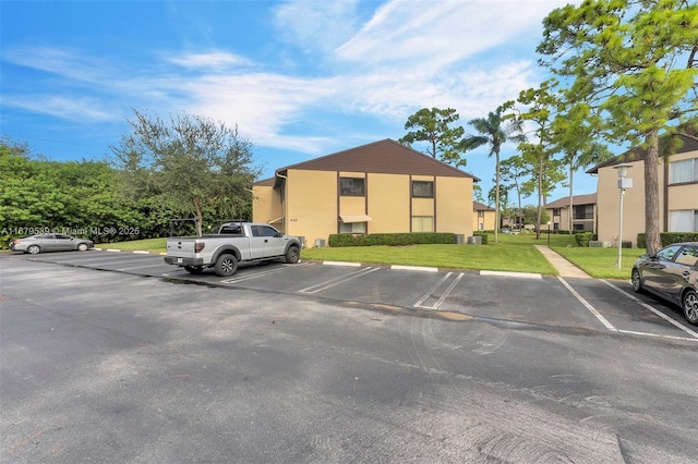 442 Pine Glen Ln Unit D-2, Green Acres, FL 33463 - view of uncovered parking lot