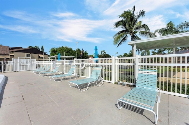 442 Pine Glen Ln Unit D-2, Green Acres, FL 33463 - view of patio / terrace featuring fence