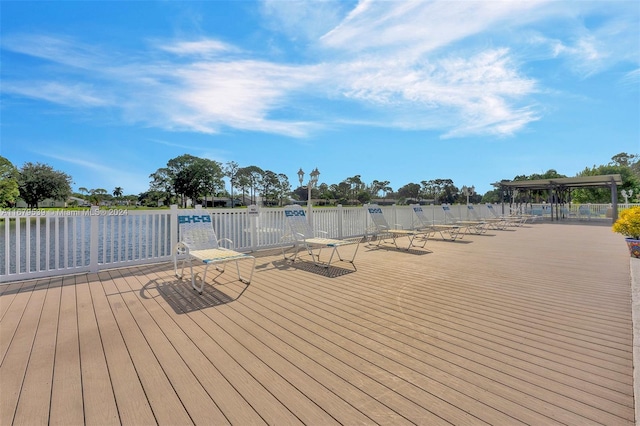 deck featuring a water view