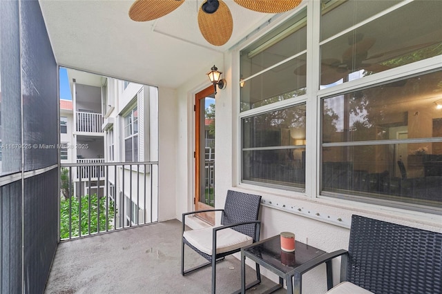 balcony featuring ceiling fan