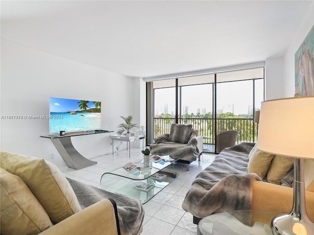 living room featuring light tile patterned floors and floor to ceiling windows