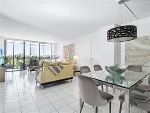 dining area featuring light tile patterned floors