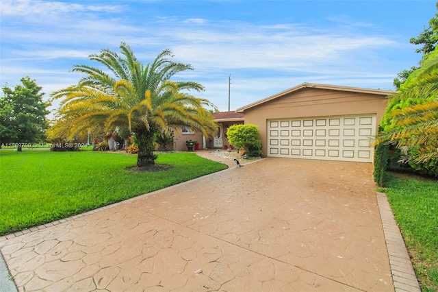 ranch-style house with a front yard and a garage