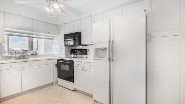 kitchen with backsplash, sink, light tile patterned flooring, white cabinetry, and white appliances