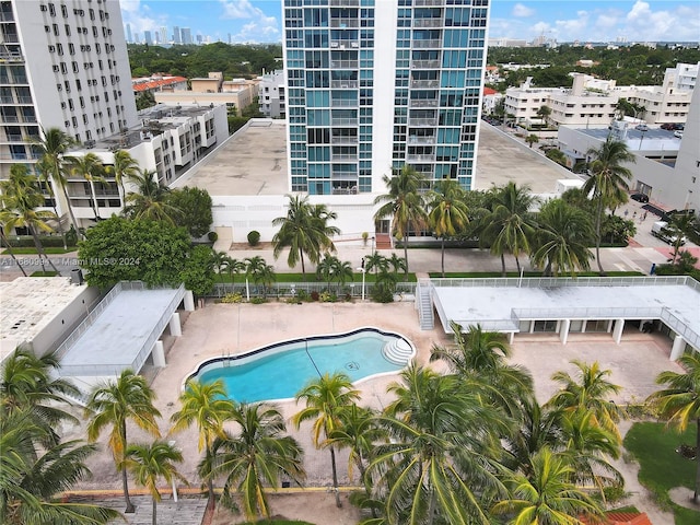 view of swimming pool with a patio area