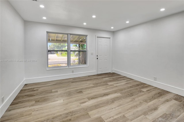 empty room featuring light hardwood / wood-style floors