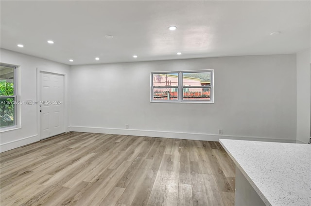 empty room with light wood-type flooring