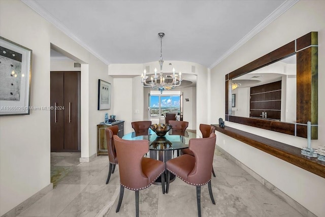 dining space featuring ornamental molding and a chandelier