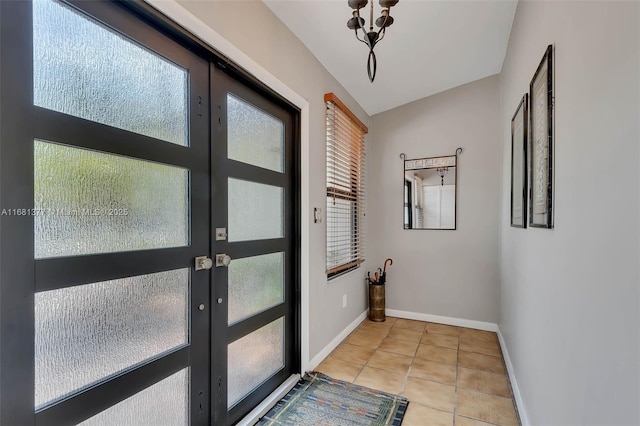 7901 SW 133rd St, Pinecrest, FL 33156 - doorway to outside with tile patterned floors and french doors