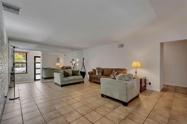 7901 SW 133rd St, Pinecrest, FL 33156 - living area featuring light tile patterned flooring and baseboards