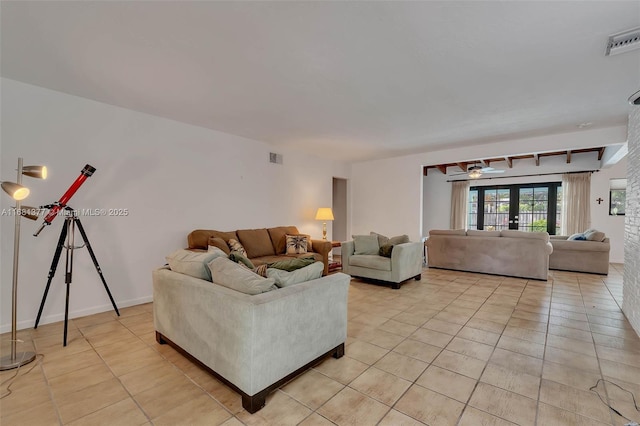 7901 SW 133rd St, Pinecrest, FL 33156 - living area with light tile patterned floors and ceiling fan