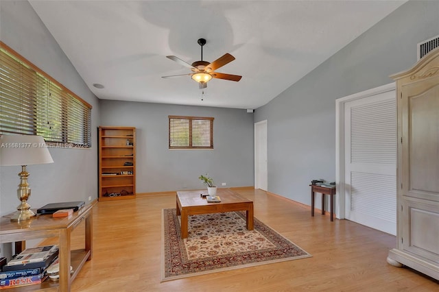 7901 SW 133rd St, Pinecrest, FL 33156 - living area with a ceiling fan and light wood-style floors