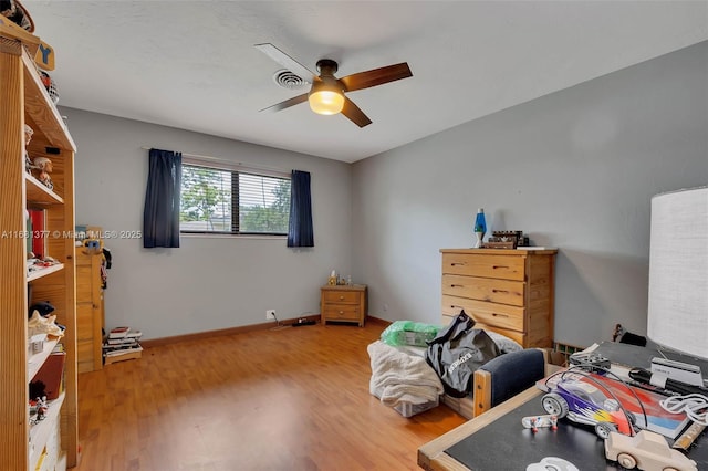 7901 SW 133rd St, Pinecrest, FL 33156 - bedroom with wood finished floors and a ceiling fan
