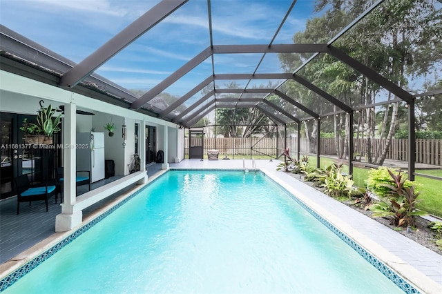 7901 SW 133rd St, Pinecrest, FL 33156 - view of swimming pool with a fenced backyard and glass enclosure