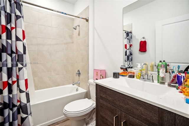 full bathroom featuring toilet, shower / bath combo, and vanity