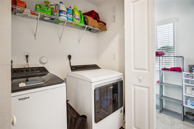 laundry area featuring washing machine and dryer