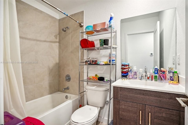 full bathroom featuring shower / tub combo with curtain, vanity, and toilet