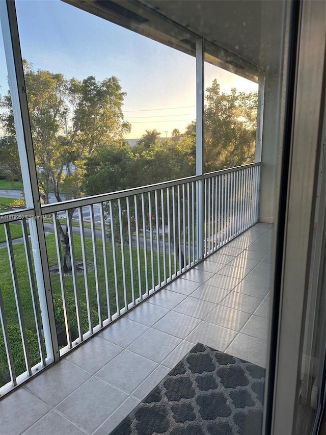 view of balcony at dusk