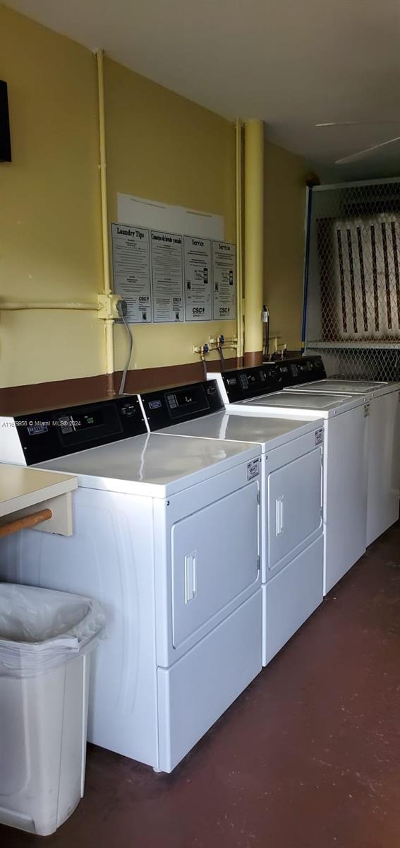 laundry area featuring washing machine and dryer