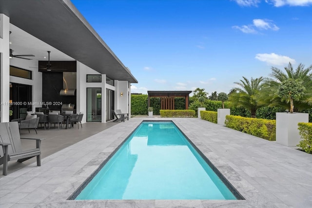 view of swimming pool with a patio