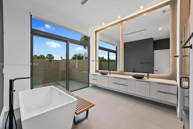 bathroom with vanity and plus walk in shower