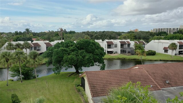 birds eye view of property featuring a water view