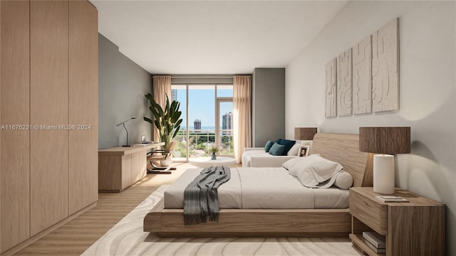 bedroom featuring light wood-type flooring