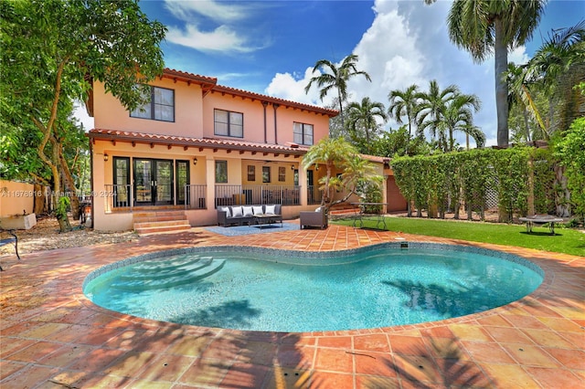 view of pool with a patio and an outdoor hangout area