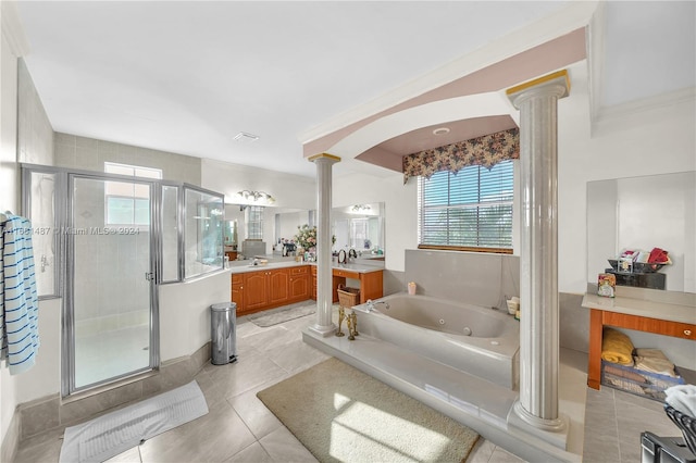 bathroom featuring vanity, decorative columns, and independent shower and bath