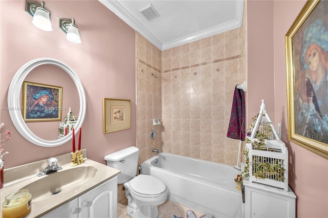 full bathroom featuring tile patterned floors, toilet, tiled shower / bath combo, ornamental molding, and vanity