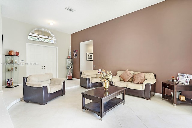 living room with light tile patterned floors