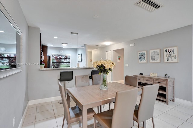 view of tiled dining space