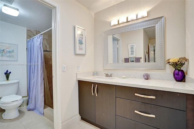 bathroom featuring a shower with curtain, vanity, toilet, and tile patterned flooring