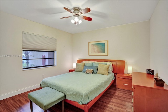 bedroom featuring hardwood / wood-style flooring and ceiling fan