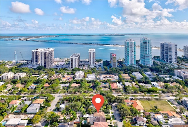 birds eye view of property featuring a water view