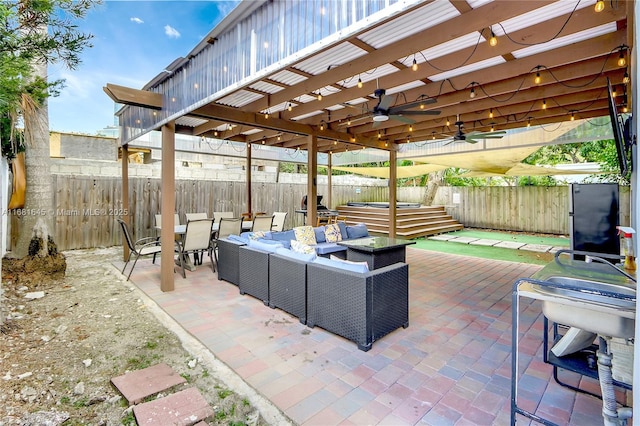 view of patio with an outdoor living space and a pergola