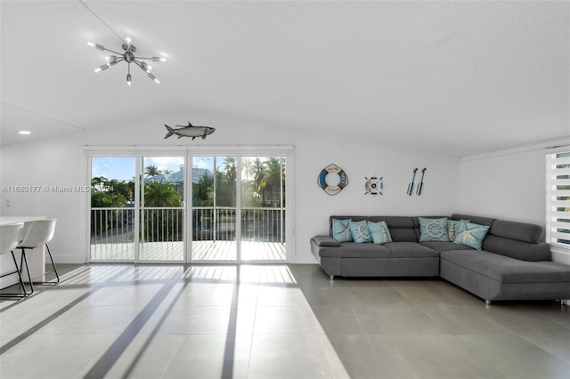 tiled living room featuring a chandelier and vaulted ceiling