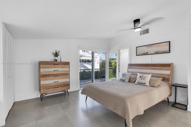 bedroom featuring lofted ceiling, access to exterior, and ceiling fan