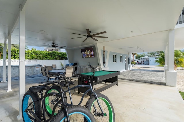 view of patio featuring ceiling fan