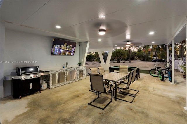 view of patio / terrace featuring sink and an outdoor kitchen