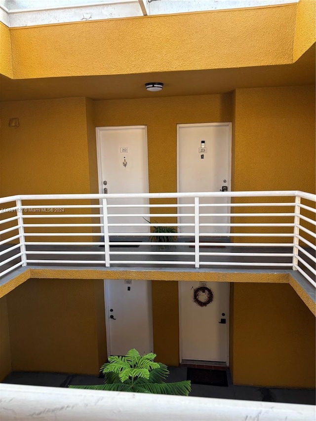 property entrance with a balcony