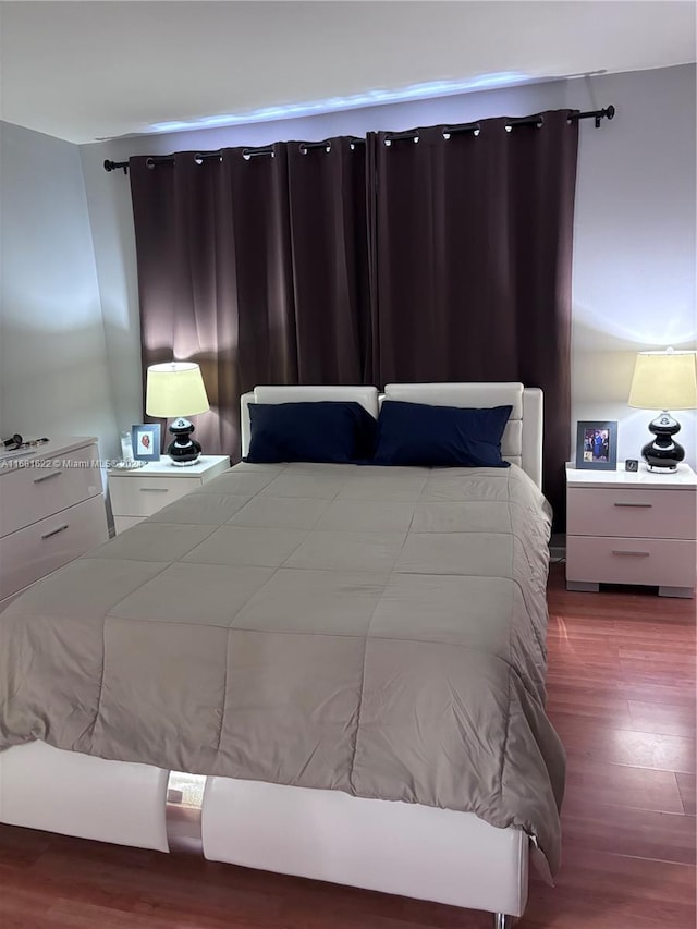 bedroom featuring light wood-type flooring