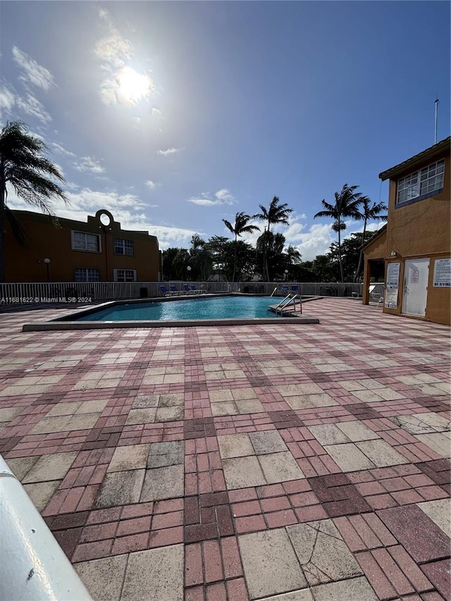 view of pool featuring a patio