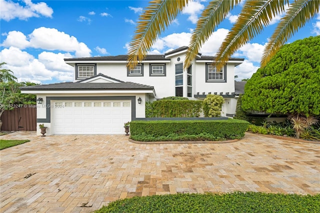 front facade with a garage