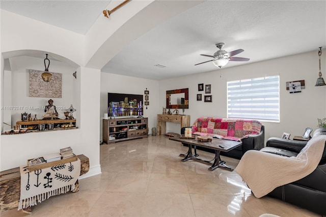 living room featuring ceiling fan