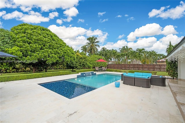 view of swimming pool featuring a patio area and outdoor lounge area