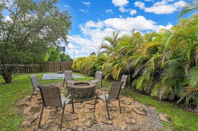 view of patio with a fire pit