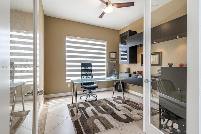 tiled home office with french doors and ceiling fan