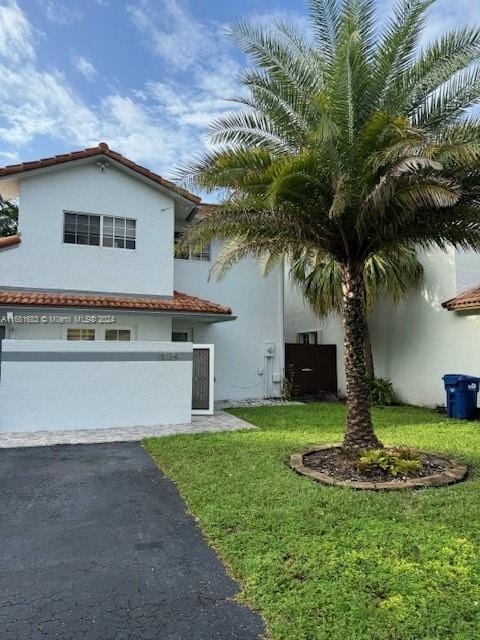 view of front of home with a front yard