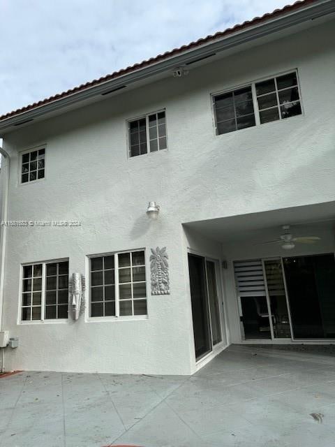 back of house featuring a patio